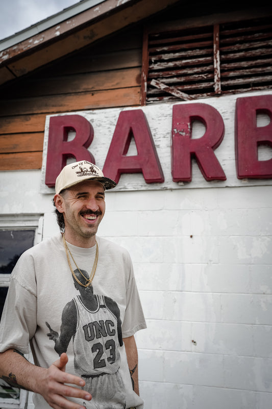 UNCIVILIZED "SHRUG" CEMENT T-SHIRT